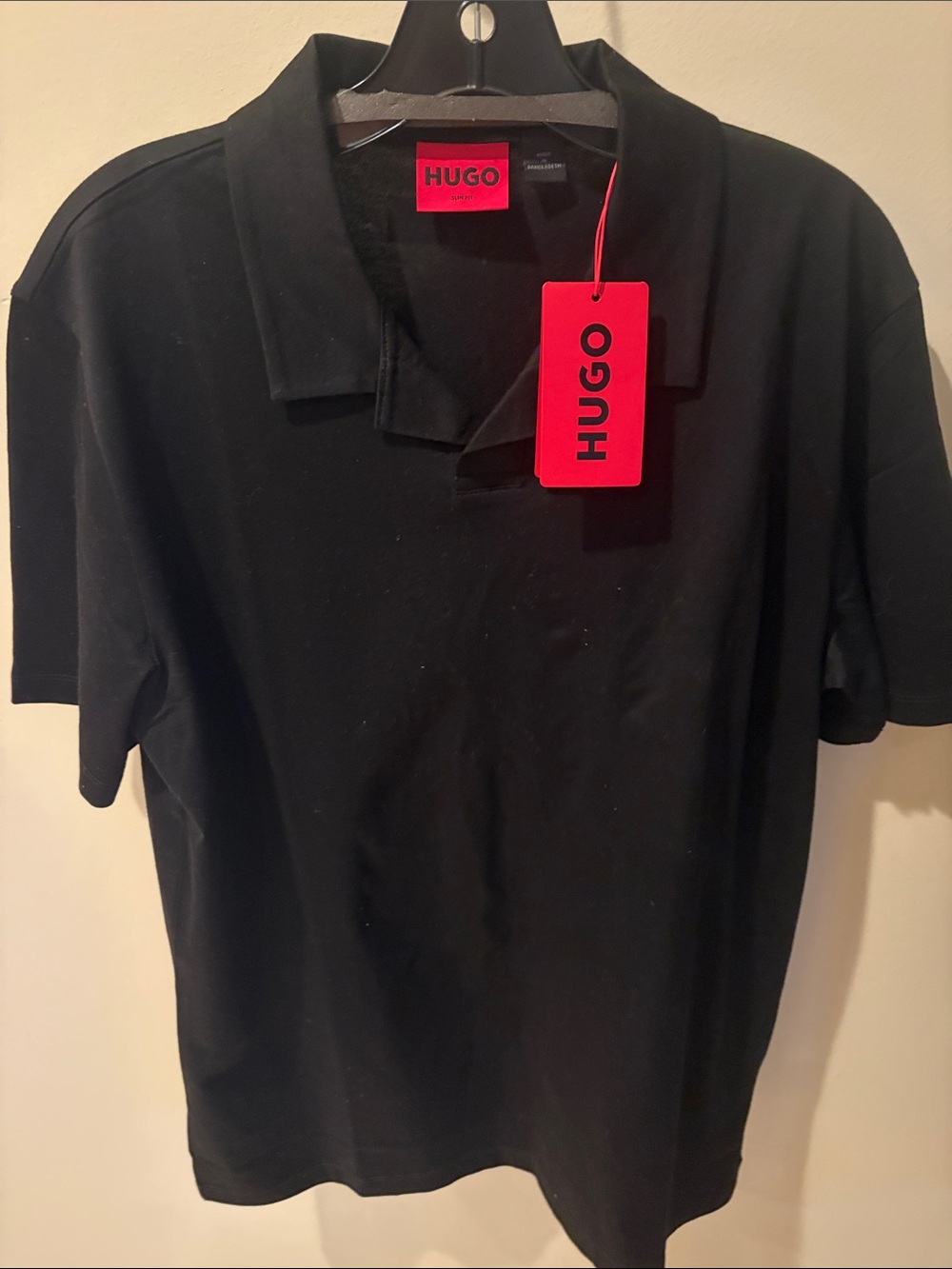 HUGO Black Polo with Red Logo Tag
